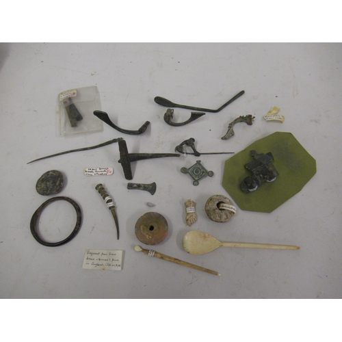 290 - Collection of Roman and other ancient brooches, tweezers etc.