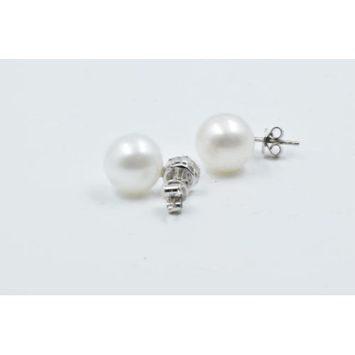 870 - Pair of 18ct white gold South Sea pearl and brilliant cut diamond cluster stud earrings, approximate... 