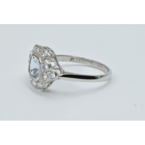 878 - Platinum ring set aquamarine and brilliant cut diamonds