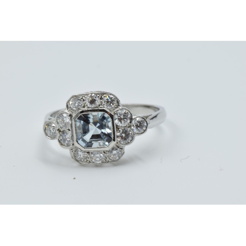 878 - Platinum ring set aquamarine and brilliant cut diamonds