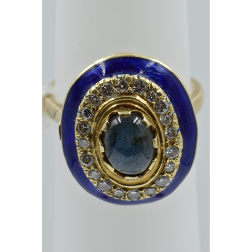 917 - 18ct Yellow gold dress ring set central cabochon sapphire surrounded by band of diamonds and blue en... 