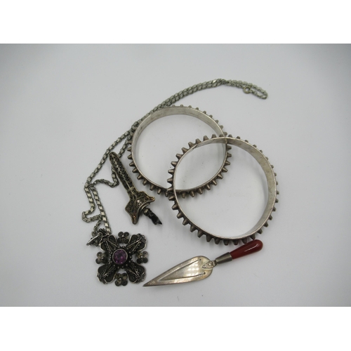 934 - Filigree silver and amethyst pendant on chain, together with a filigree sword brooch, two silver ban... 