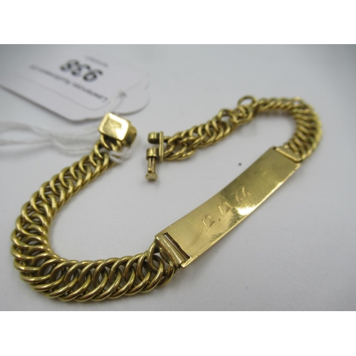 938 - An unmarked Middle Eastern yellow metal identity bracelet with curb link design, 18.5g