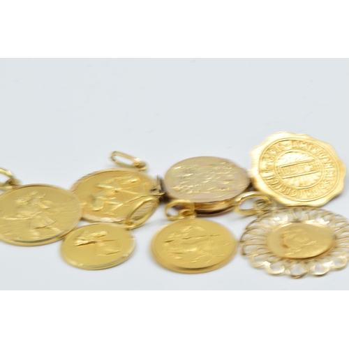 946 - Four various 18ct gold charms, 11.5g together with three various others, unmarked, 5.5g