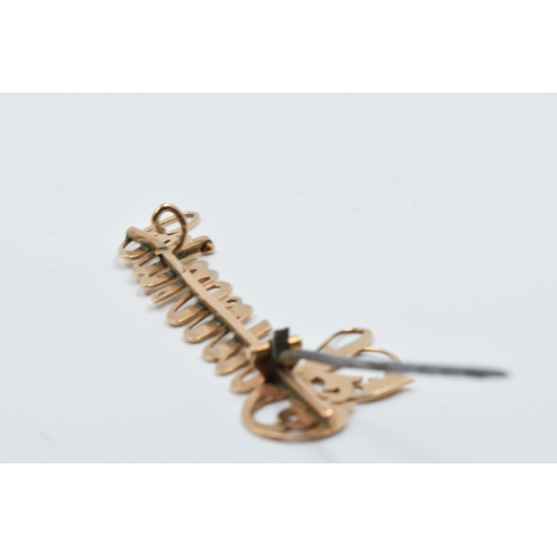 952 - Yellow metal ' souvenir ' brooch with metal pin, 4g gross