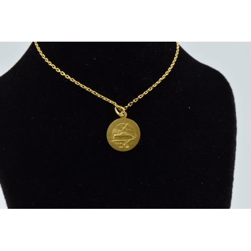 954 - 18ct Gold St. Christopher pendant and chain, 4.5g