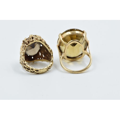 963 - Large 9ct gold citrine set ring, together with a 9ct gold smoky quartz ring