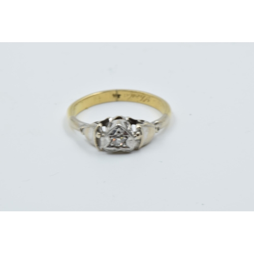 965 - Two 18ct yellow gold two stone diamond crossover rings, together with a diamond solitaire ring