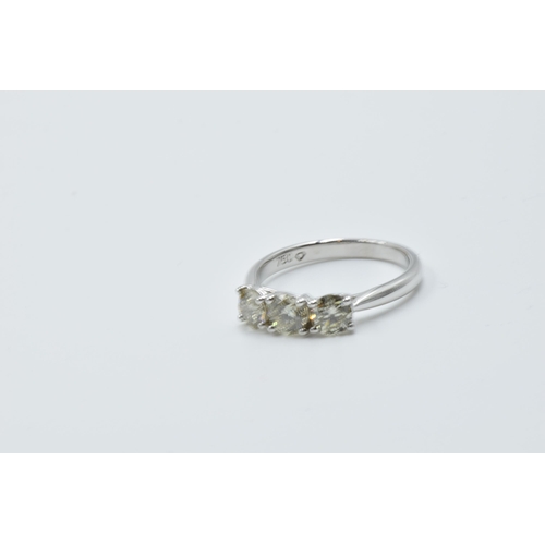 979 - 18ct White gold brilliant cut diamond trilogy ring, the diamonds approximately 1.02ct, together with... 