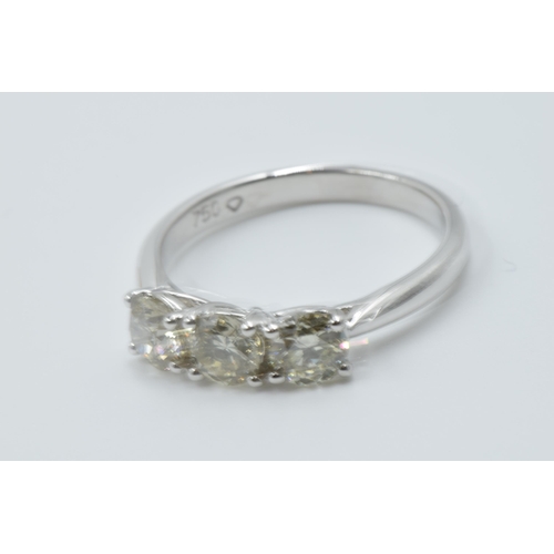 979 - 18ct White gold brilliant cut diamond trilogy ring, the diamonds approximately 1.02ct, together with... 