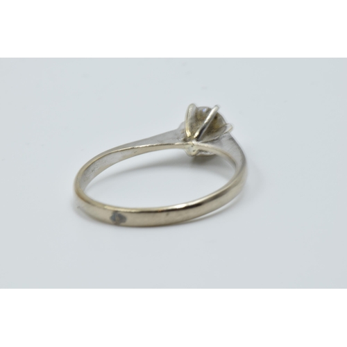 988 - 18ct Gold diamond solitaire ring of approximately 0.25ct