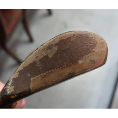 116 - Early Hickory shafted weighted golf wood, together with two steel headed clubs