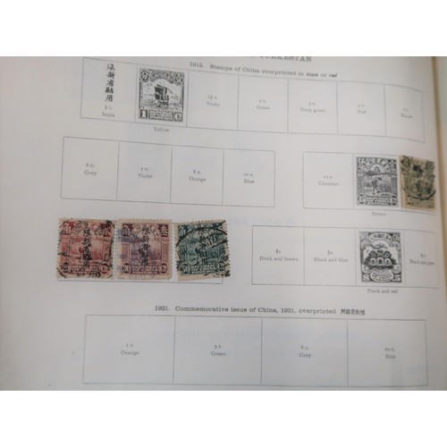 219 - Two large green Ideal postage stamp albums containing an extensive collection of World stamps, toget... 