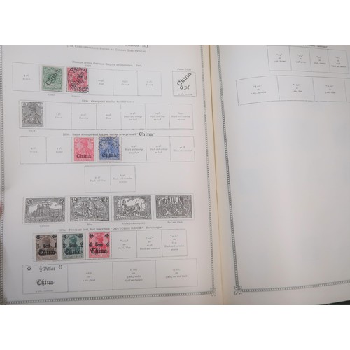 219 - Two large green Ideal postage stamp albums containing an extensive collection of World stamps, toget... 