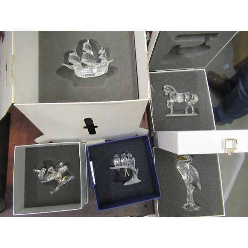 612 - Collection of twenty two various Swarovski crystal figures, in various mainly rectangular and square... 