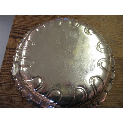 775 - Continental white metal circular dish with a wrythen border and an engraved centre panel, 9.5ins dia... 