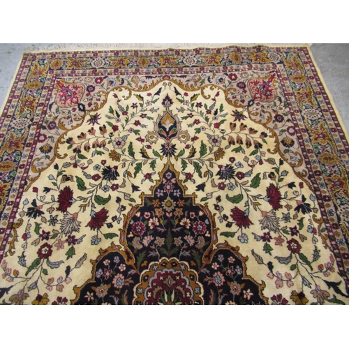 13 - 20th Century Kirman part silk rug with a lobed floral medallion and stylised floral design on a midn... 