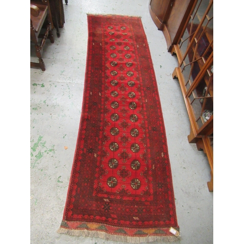 26 - Antique Kurdish rug, having all over stylised floral design, midnight ground with multiple borders, ... 