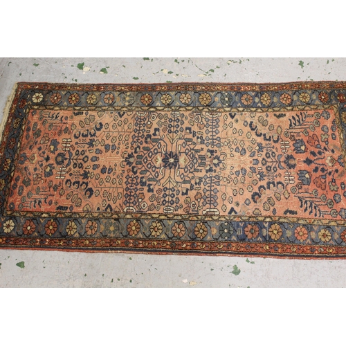 28 - Small Qashqai rug with a lobed medallion and all-over stylised design on a red and blue ground with ... 