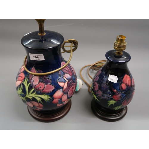 508 - Modern Moorcroft baluster form table lamp with a typical stylised floral design, 8ins high excluding... 