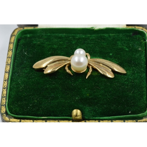 1011 - 9ct Gold insect brooch set two cultured pearls, in original fitted box