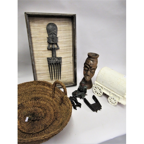 138 - African hardwood figural hair comb, framed, two other items of African native wood carving, a woven ... 