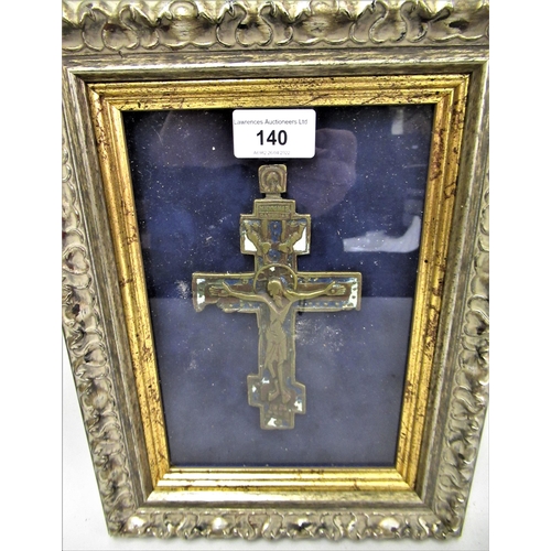 140 - Patinated and painted brass Orthodox crucifix, 6.25ins high, in a gilt and silvered frame