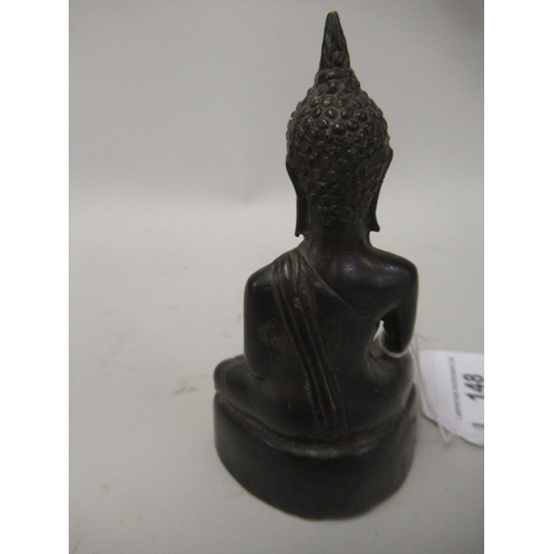 148 - Oriental bronze figure of a seated Buddha, 4.5ins high