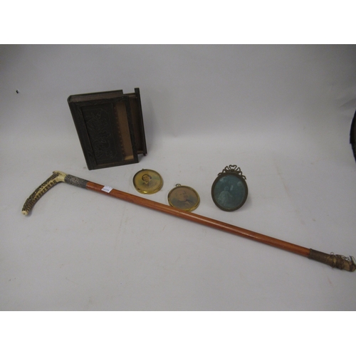 166 - Silver mounted antler riding crop, carved oak cigarette box and three portrait miniature frames