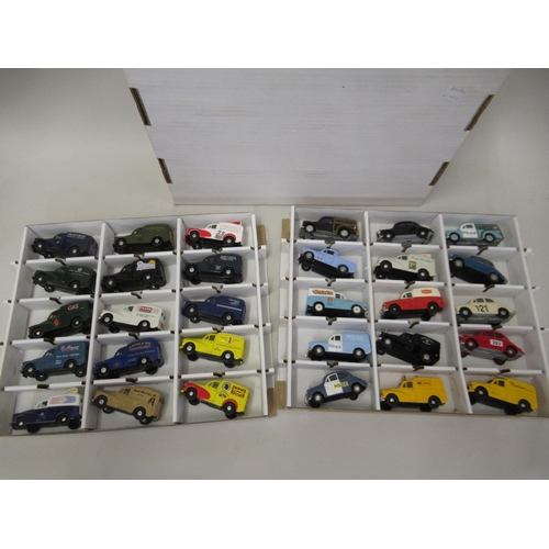 167 - Box containing two trays of mainly Corgi diecast model vehicles of advertising Morris Minor vans