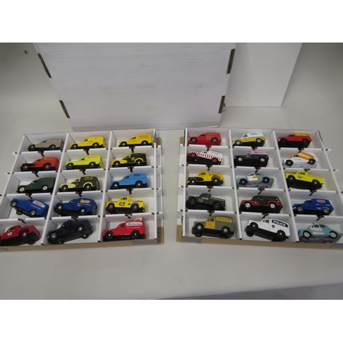 168 - Box containing two trays of mainly Corgi diecast model vehicle Morris Minor cars, police vehicles an... 