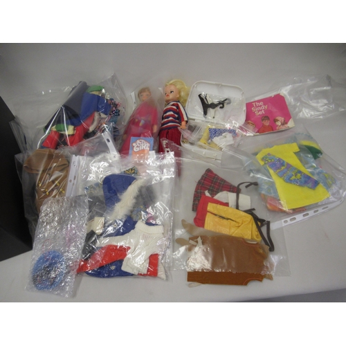 191 - One Sindy doll and one Action Girl together with clothing and accessories