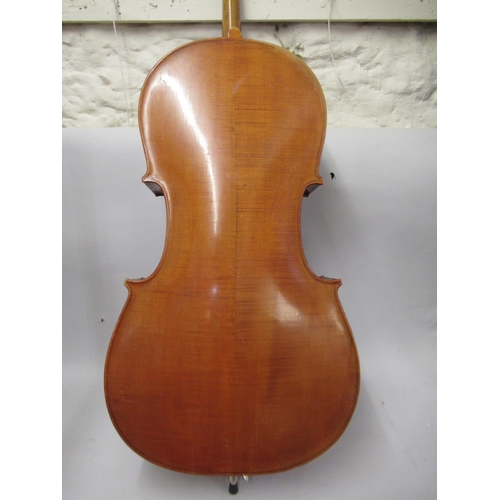 192 - Late 19th / early 20th Century cello with 29.5in two section back, with bow, in a soft case