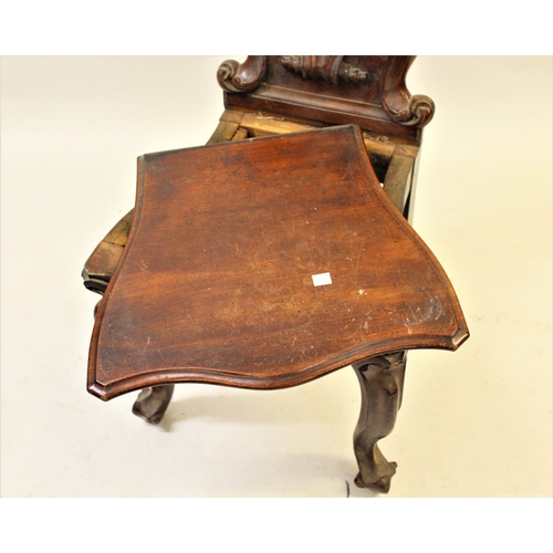 2037 - Victorian carved mahogany hall chair with a shaped back and panel seat on cabriole front supports