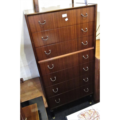 2052 - E. Gomme for G Plan, mid 20th Century teak narrow chest of seven drawers with brass handles, raised ... 