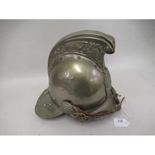 211 - Late 19th / early 20th Century Merryweather fireman's helmet with embossed silvered decoration and c... 