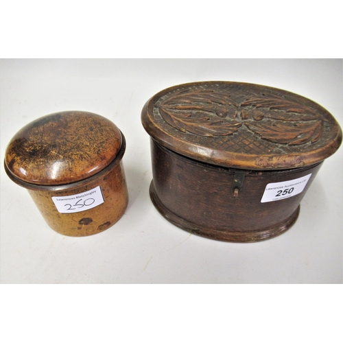 250 - Small oak oval treenware box, the cover carved with thistles, and another circular treenware box