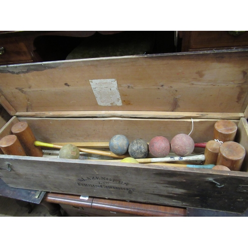 257 - Early 20th Century cased croquet set by Slazengers