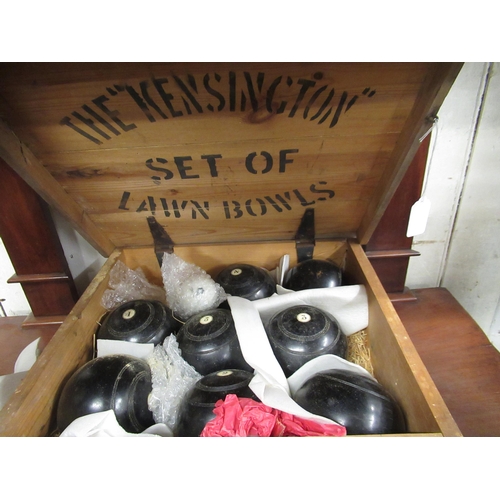 258 - Cased set of Kensington lawn bowls