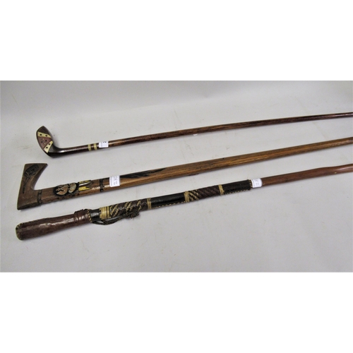 280 - 20th Century walking cane in the form of a golf club, and two other walking canes