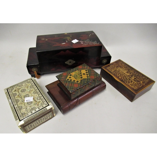 282 - Two small boxes in the form of books, a Japanese musical jewellery box and two other trinket boxes