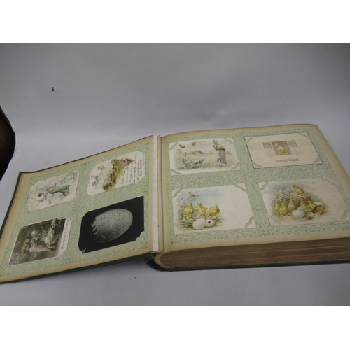 325 - Early 20th Century French green canvas covered postcard album, containing an extensive collection of... 