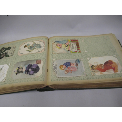 325 - Early 20th Century French green canvas covered postcard album, containing an extensive collection of... 