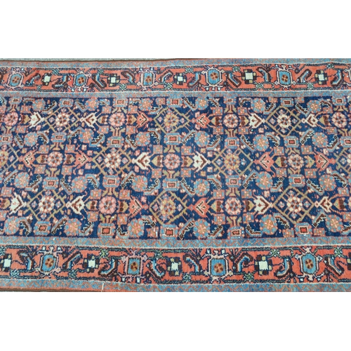 4 - Hamadan runner with all-over Herati design on a midnight blue ground with borders, 12ft 10ins x 3ft ... 