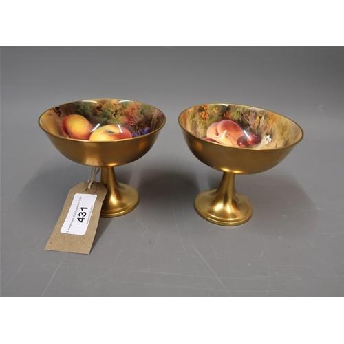 431 - Pair of Royal Worcester pedestal cups internally painted with fruits, one by Ricketts, the other by ... 