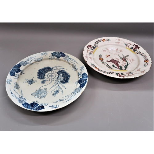 530 - 18th Century polychrome Delftware plate decorated with a bird and foliage, 13.5ins diameter (at faul... 