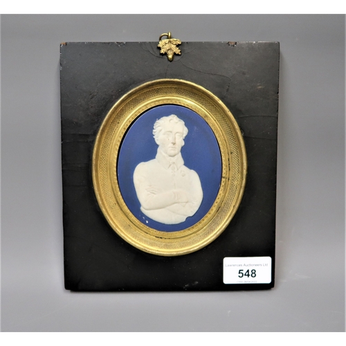 548 - Wedgwood blue and white jasperware plaque, mounted in a gilt and ebonised frame possibly of Wellingt... 