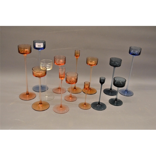 554 - Group of fourteen Ronald Stennett Willson of Brancaster glass candle holders of various colours, inc... 