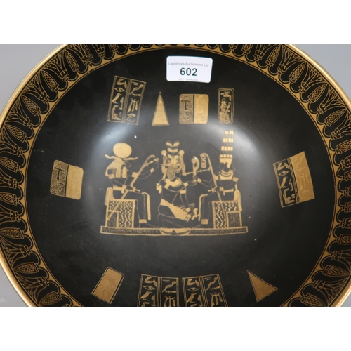 602 - W & R Carlton Ware pedestal bowl decorated with Egyptian figures and emblems in gilt on a black grou... 