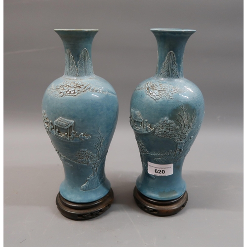 620 - Pair of late 19th / early 20th Century Chinese pale blue stoneware baluster form vases with relief d... 